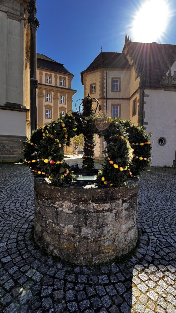 kloster schöntal mit osterbrunnen